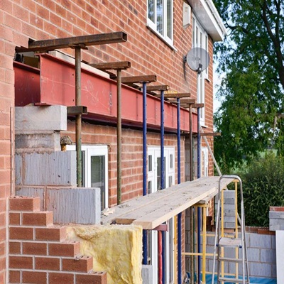 installing,metal,beam,during,house,extension